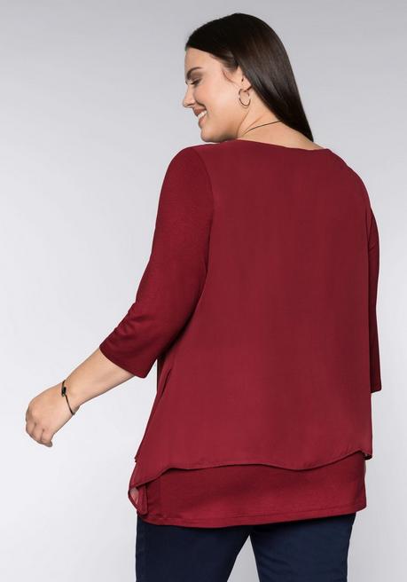 sheego Blusenshirt in leichter A-Linie mit Zipfelsaum - rubinrot sheego Riesige Rabatte