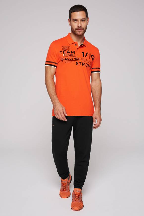 Soccx Pikee-Polo mit Flockprint signal orange Super Sparpreis