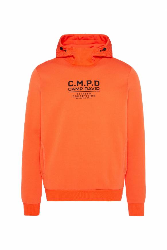 Soccx Hoodie im Materialmix mit Artwork und Rückentasche signal orange Begrenzte Freigabe