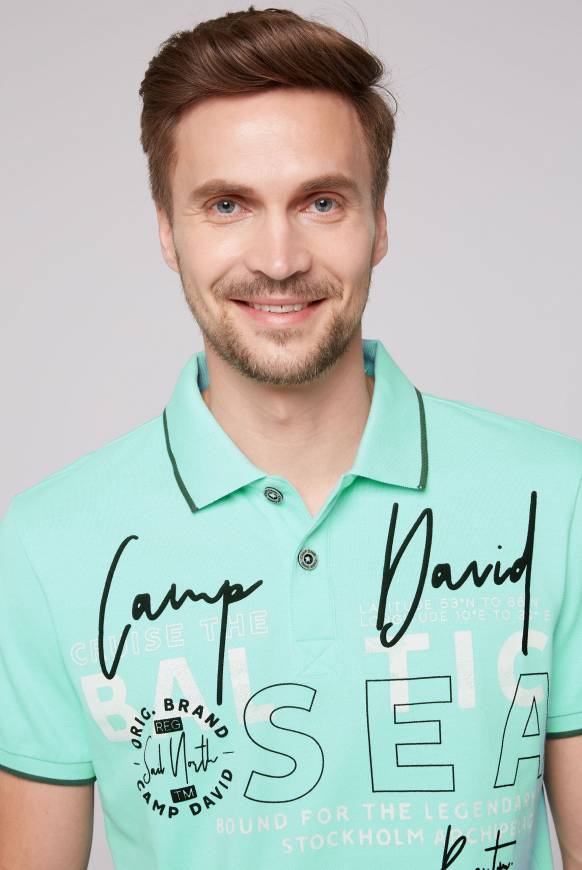 Soccx Poloshirt aus Pikee mit Rubber Print flash aqua Im Verkauf