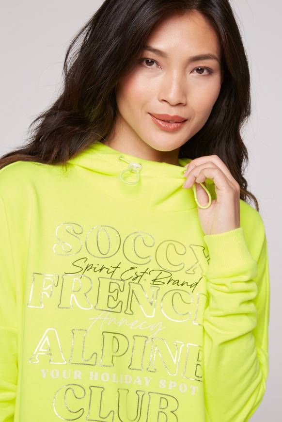 Soccx Sweatshirt mit Kapuze und Print Artwork yellow lime Begrenzte Freigabe
